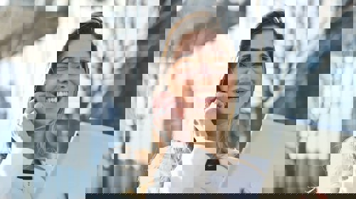 Woman In White Blazer Holding Tablet Computer 789822